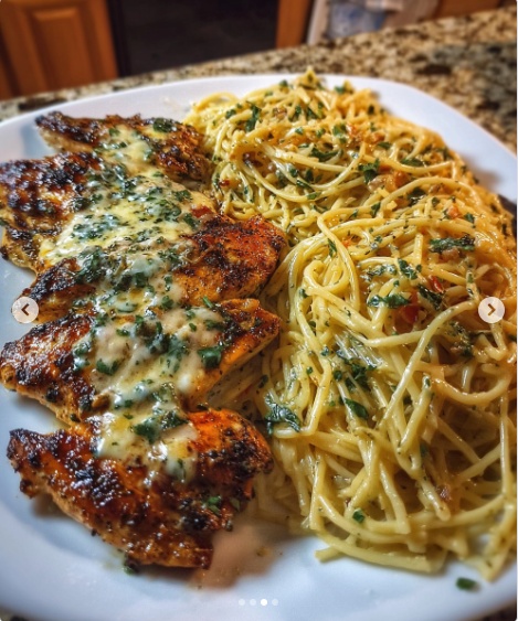 Garlic Butter Chicken Pasta with garlic herb spaghetti and pan seared cutlets